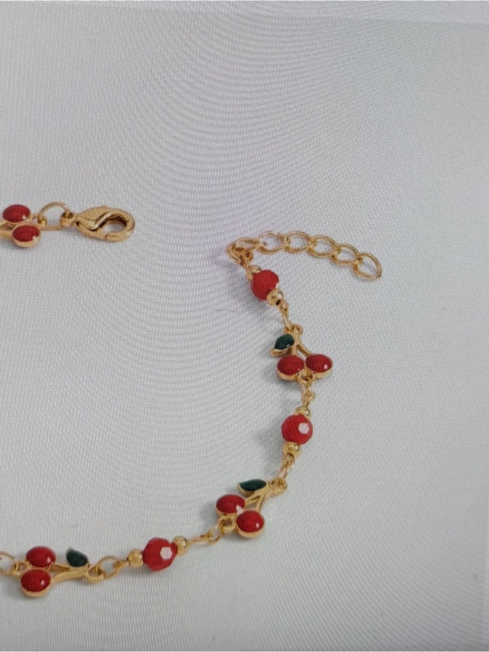 Set of two , Gold-Tone Bracelet with Red Cherry Charms and Green Leaves.